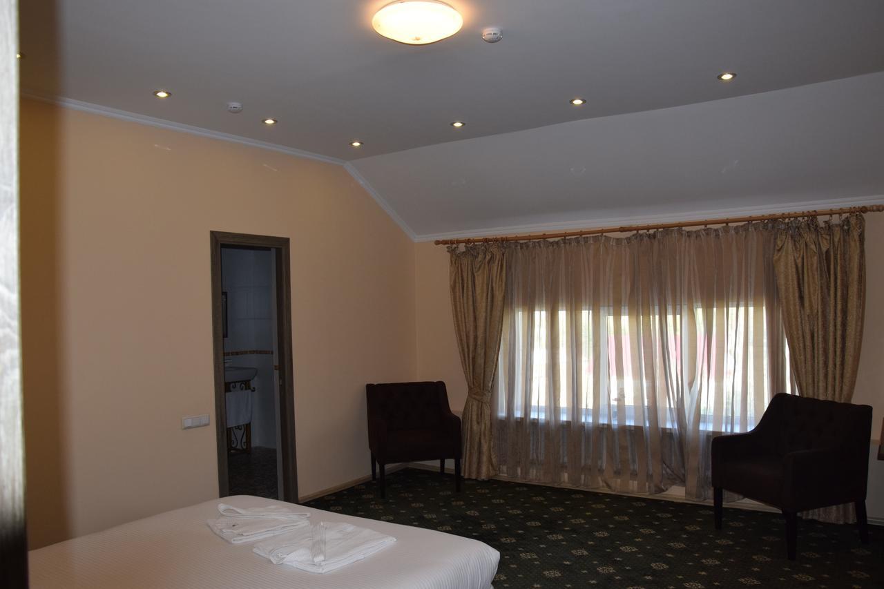 Almaport Hotel Talghar ภายนอก รูปภาพ